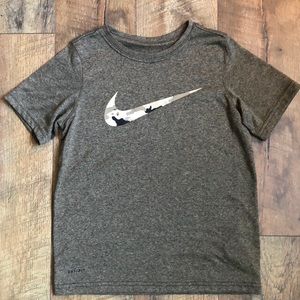 Boys Nike Dri-Fit tee with camo swoosh